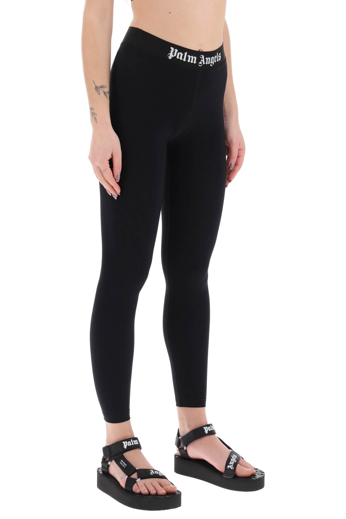 Palm angels sporty leggings with branded stripe-1