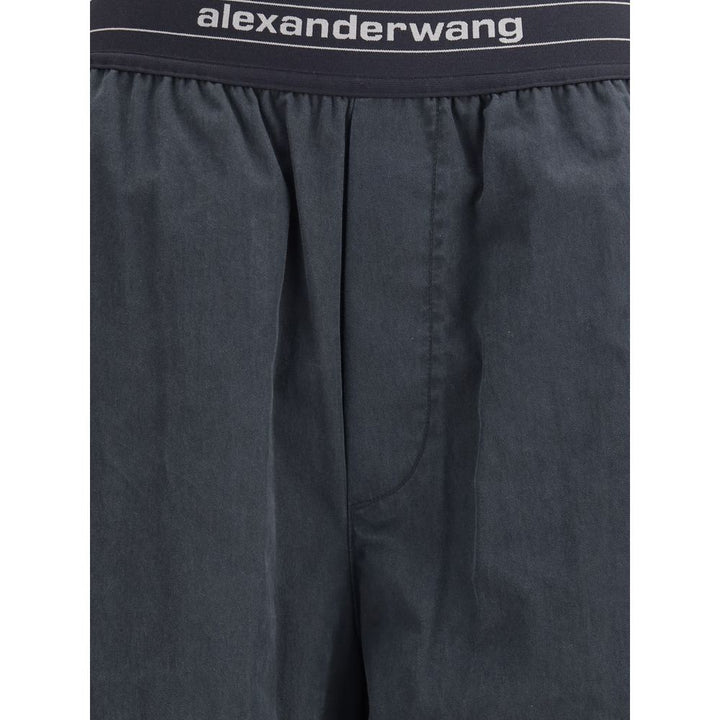 Trousers with elastic waistband and contrasting jacquard logo