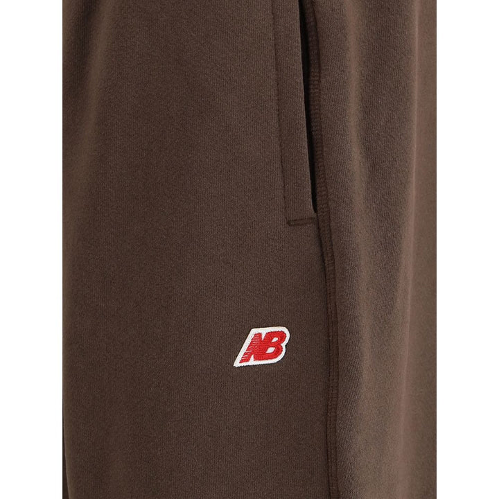 New Balance Elastic-waistband logo-patch track Pants