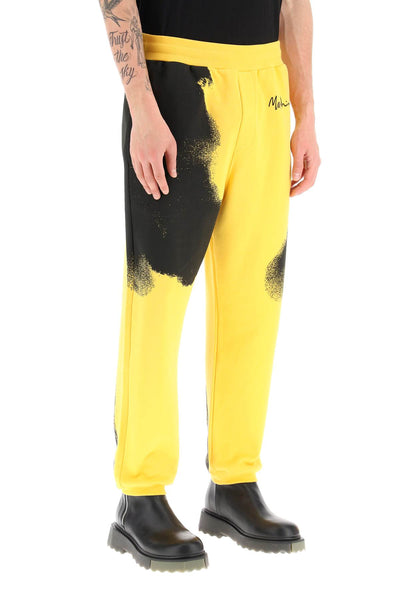 Moschino graphic print jogger pants with logo-1