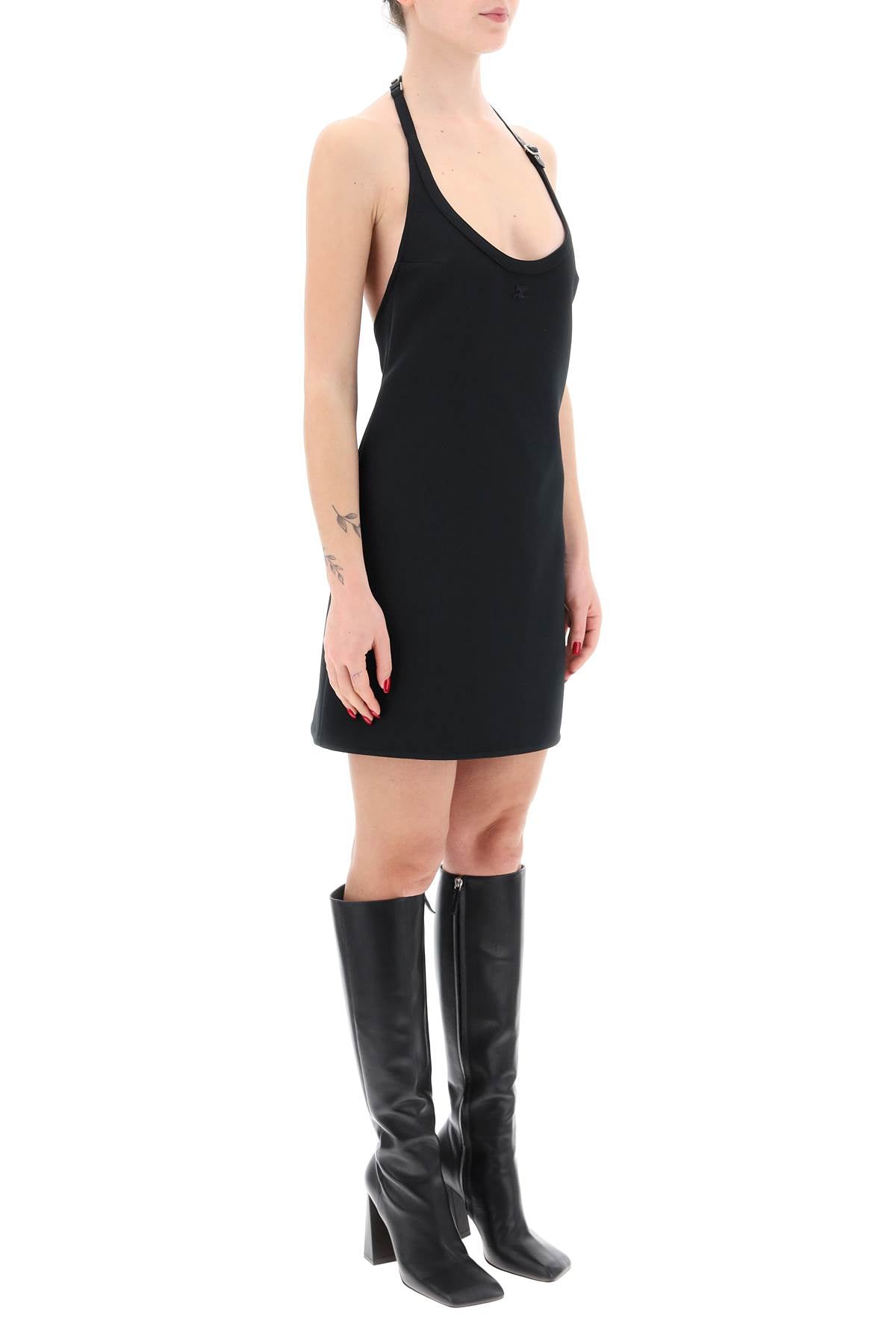 Courreges mini dress with strap and buckle detail.-1