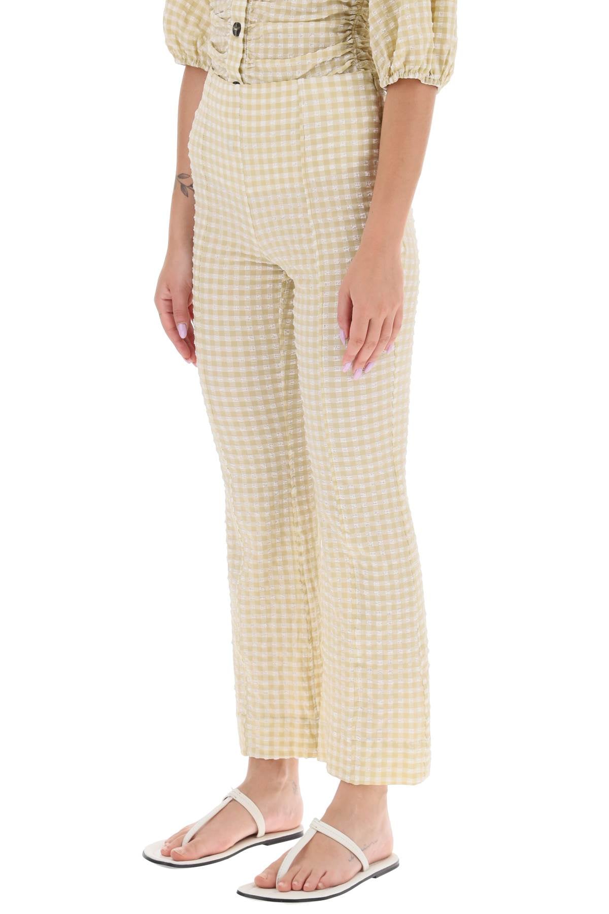 Ganni flared pants with gingham motif-3